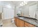 Elegant bathroom featuring a granite countertop and white shower curtain at 2823 Providence Rd # 236, Charlotte, NC 28211