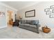 Cozy living room with neutral palette features comfortable seating and tasteful decor throughout the space at 2823 Providence Rd # 236, Charlotte, NC 28211