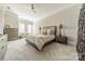 Spacious main bedroom with neutral tones and a ceiling fan at 2823 Providence Rd # 236, Charlotte, NC 28211