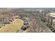 Aerial view showcasing the community's layout and surrounding nature at 3120 Minnesota Rd, Charlotte, NC 28208