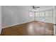 Bedroom featuring hardwood floors, plenty of natural light, ceiling fan and neutral paint at 3120 Minnesota Rd, Charlotte, NC 28208