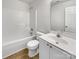 Bathroom featuring a shower-tub combination, mirror, and single sink vanity at 3212 Irwin Valley Ct, Charlotte, NC 28269