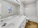 Bright bathroom featuring a double sink vanity, large mirror, and shower-tub combination at 3212 Irwin Valley Ct, Charlotte, NC 28269