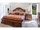 Beautiful main bedroom with decorative headboard, large windows, and elegant furnishings at 358 Caffee Dr, Kings Mountain, NC 28086