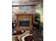 Living room showcasing a charming fireplace with a decorative wooden mantle at 410 Yadkin St, Salisbury, NC 28146