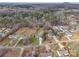 An aerial view of a residential neighborhood and tree coverage at 4205 Ore Bank Dr, Lincolnton, NC 28092