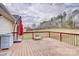 Expansive wooden deck with outdoor seating overlooking a partially fenced yard at 4205 Ore Bank Dr, Lincolnton, NC 28092