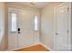 Inviting foyer with a glass-panel front door, hardwood flooring, and ample natural light at 4205 Ore Bank Dr, Lincolnton, NC 28092