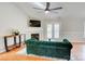 Bright living room featuring a fireplace and access to the outdoor deck at 4205 Ore Bank Dr, Lincolnton, NC 28092