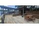 Dock featuring comfortable seating, a dining area, and boat storage at 604 Fairway Shores Rd, Mount Gilead, NC 27306
