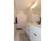 Bright bathroom with double sinks, and shower with white curtain at 615 R L Stowe Rd, Belmont, NC 28012