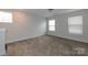 Bedroom featuring a carpet floor, base trim and a window at 615 R L Stowe Rd, Belmont, NC 28012