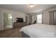 Bright bedroom features a dresser and tv at 615 R L Stowe Rd, Belmont, NC 28012