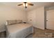 Bedroom with carpet, ceiling fan, a queen bed, and closet at 615 R L Stowe Rd, Belmont, NC 28012