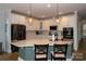 Stylish kitchen with quartz countertops, stainless appliances, and modern pendant lighting at 615 R L Stowe Rd, Belmont, NC 28012