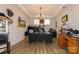 Spacious home office features a tray ceiling, an abundance of natural light, and hardwood floors at 615 R L Stowe Rd, Belmont, NC 28012