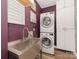 Functional laundry area with modern washer/dryer and ample storage at 620 Briar Patch Ter, Waxhaw, NC 28173