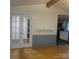 Open concept living room featuring french doors and view into kitchen at 6271 Sherwood Ln, Denver, NC 28037