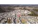 Aerial view of a community with houses lined around a street at 649 Shellbark Dr, Concord, NC 28025