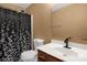 Bathroom featuring a vanity, mirror, toilet, and shower with decorative curtain at 649 Shellbark Dr, Concord, NC 28025