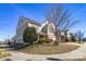 Street view of a two-story home with mature trees and well-maintained landscaping at 649 Shellbark Dr, Concord, NC 28025