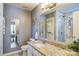 A bathroom featuring a granite countertop, sink, mirror, toilet, and walk-in shower at 7918 Travers Run Dr, Charlotte, NC 28215