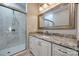 Modern bathroom with marble countertop vanity, framed mirror, and glass shower at 801 Sandifer Rd, York, SC 29745