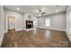 Bright living room with hardwood floors and a decorative brick fireplace at 801 Sandifer Rd, York, SC 29745