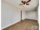 Open living space with wood floors and a doorway to another room at 801 Sandifer Rd, York, SC 29745