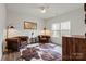 Cozy living room with tufted leather chairs, hardwood floors, and natural light at 820 Bellegray Rd, Clover, SC 29710