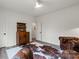 Cozy living room with tufted leather chairs, hardwood floors, and natural light at 820 Bellegray Rd, Clover, SC 29710