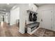 Well-organized mudroom with bench seating, hooks, and storage cabinets at 820 Bellegray Rd, Clover, SC 29710