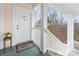 Charming porch view with welcome mat and flowers at 8759 Coralbell Ln, Charlotte, NC 28213