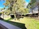 Large backyard with mature trees, and a wooden fence at 9146 Austin Ridge Ln, Charlotte, NC 28214