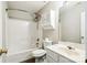 This bathroom offers a shower-tub combo and a cabinet above the toilet at 9146 Austin Ridge Ln, Charlotte, NC 28214