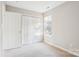 Inviting bedroom featuring a window providing natural light, and closet for storage solutions at 9146 Austin Ridge Ln, Charlotte, NC 28214