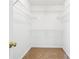 Walk-in closet with shelving, neutral carpet, and plenty of storage space at 9146 Austin Ridge Ln, Charlotte, NC 28214