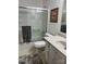 Clean bathroom with a shower-tub combo and vanity at 9808 Arbor Dale Ave, Charlotte, NC 28215