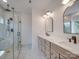 Bathroom with a walk-in shower, double sink vanity and modern lighting at 0004 Mission Church Rd, Locust, NC 28097