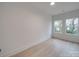 Minimalist bedroom with wood floors and natural light at 0004 Mission Church Rd, Locust, NC 28097