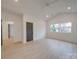 Bright, airy bedroom featuring hardwood floors, neutral walls, and a modern ceiling fan at 0004 Mission Church Rd, Locust, NC 28097