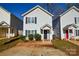 Charming two-story home featuring a symmetrical facade, tidy landscaping, and inviting curb appeal at 1008 Beaugard Dr, Charlotte, NC 28208