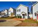 Street view of a row of homes featuring tidy landscaping, symmetrical facades, and inviting curb appeal at 1008 Beaugard Dr, Charlotte, NC 28208