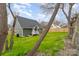 A verdant backyard featuring a modern green house, ideal for relaxation and outdoor enjoyment at 102 S Liberty St, Gastonia, NC 28052