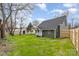 Large backyard with lush green grass and privacy fence at 102 S Liberty St, Gastonia, NC 28052