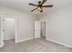 This bedroom features a ceiling fan and a closet at 102 S Liberty St, Gastonia, NC 28052