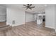 Spacious open-plan living area with hardwood floors and a kitchen view at 102 S Liberty St, Gastonia, NC 28052