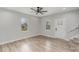 Bright living room with hardwood floors, and natural light from windows at 102 S Liberty St, Gastonia, NC 28052