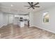 Bright living room flows into the kitchen, featuring hardwood floors at 102 S Liberty St, Gastonia, NC 28052