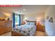 Cozy bedroom with wood furniture, carpeted floor, natural lighting, and playful decor at 107 Windstone Common Ln, Mooresville, NC 28117